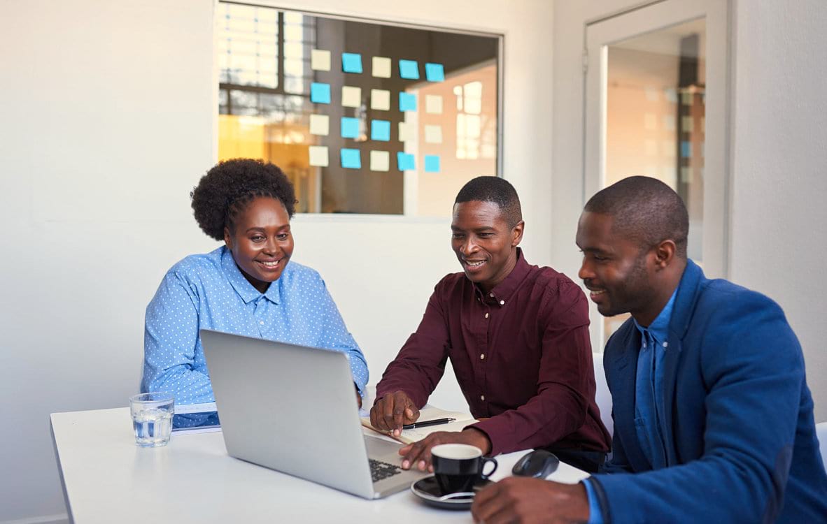 3 people looking at the laptop